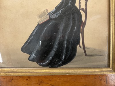 Lot 784 - Regency silhouette portrait of a lady seated in profile.