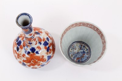 Lot 74 - An 18th century Chinese Imari beaker, and a Japanese Imari bottle vase