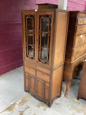 Lot 1218 - Chinese hardwood narrow display cabinet with glazed upper section above twin cupboards and drawers below, 72cm wide x 165cm high x 39cm deep