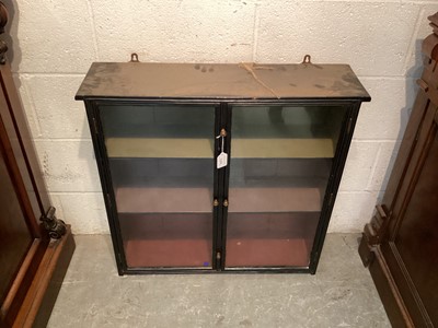 Lot 1209 - 19th century ebonised hanging wall cabinet, the glazed doors enclosing two shelves, 74cm wide x 20cm deep x 72cm high