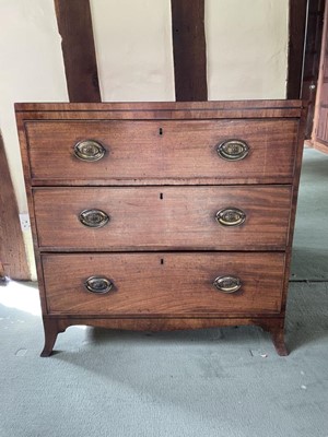 Lot 1227 - George III mahogany chest of three long drawers