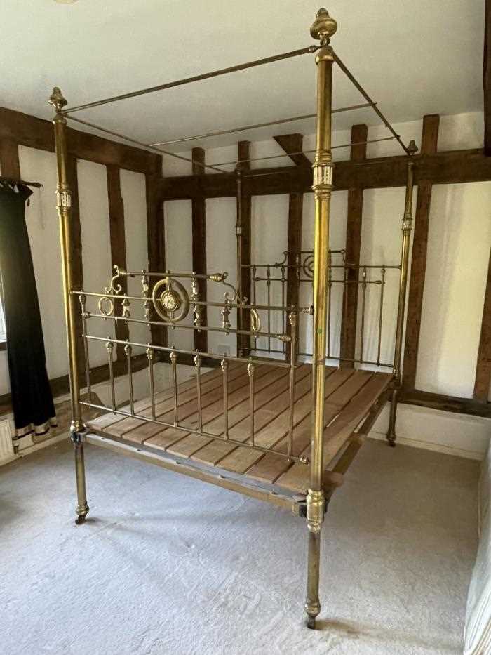 Lot 1201 - Victorian brass four poster bed