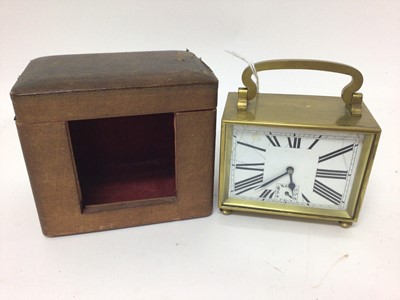 Lot 676 - Art Deco-style carriage clock with enamel dial in brass case, striking movement on bell, 11.5 cm high in carrying case