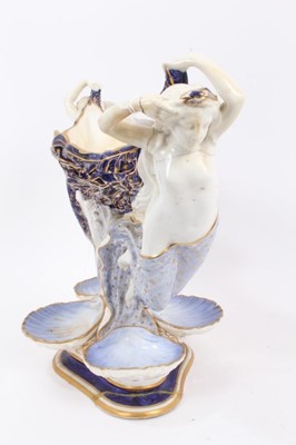 Lot 18 - Large Belgian Art Nouveau pottery vase, 44cm high, together with a continental centrepiece, in the form of two nude female figures holding a seaweed bowl, with four smaller shell-shaped bowls aroun...
