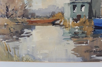 Lot 161 - *Edward Wesson watercolour - River Landscape, signed, in glazed frame, together with a copy of a related book