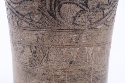 Lot 137 - An unusual antique earthenware beaker, inscribed 'PIERRE DE LA MER - MORTE', with incised foliate patterns, 8cm high