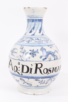 Lot 108 - A faience apothecary bottle, painted in blue with animals and foliate patterns, inscription reading 'Aq. Di Rosmarino', mark to base, 25cm high