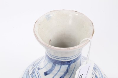 Lot 108 - A faience apothecary bottle, painted in blue with animals and foliate patterns, inscription reading 'Aq. Di Rosmarino', mark to base, 25cm high