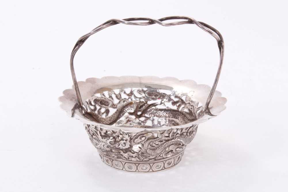 Lot 285 - Late 19th/early 20th century Chinese silver dish of circular form with pierced dragon decoration