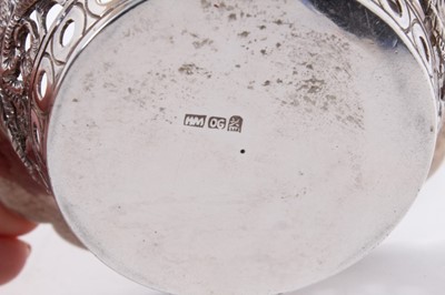 Lot 285 - Late 19th/early 20th century Chinese silver dish of circular form with pierced dragon decoration