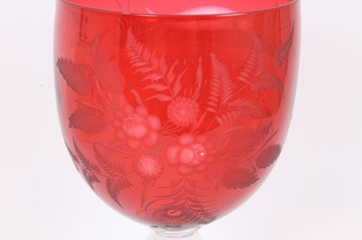 Lot 141 - Victorian cranberry overlay crystal goblet hand engraved 'Ben Topp Rushton Arms Aug 4th 1877' beneath a fish possibly celebrating the result of a fishing competition