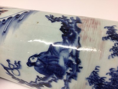 Lot 126 - A Chinese Transitional-style sleeve vase, 19th/20th century, decorated in underglaze blue and red with a figural scene, 26cm high