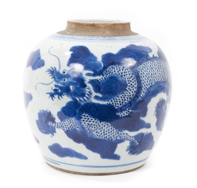 Lot 127 - A Chinese blue and white ginger jar, 18th/19th century, painted with a dragon chasing a flaming pearl, 17.5cm high