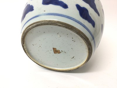 Lot 127 - A Chinese blue and white ginger jar, 18th/19th century, painted with a dragon chasing a flaming pearl, 17.5cm high