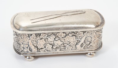 Lot 316 - Late 19th century Chinese silver hairpin box with hinged cover of oval form with prunus decoration on ball feet, Chinese mark and 'Luen Wo' mark. 11.5 cm