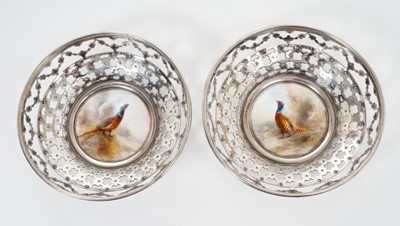Lot 317 - Pair unusual George V pierced silver bon bon dishes with inset Royal Worcester porcelain plaques painted by James Stinton with pheasants ( Birmingham 1912), Worcester marks for 1912, 10.5 cm diamet...