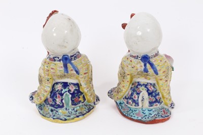Lot 131 - A pair of Chinese famille rose figures of Shou Lao, probably Republic period, together with a snuff bottle painted in iron red with the Eight Horses of Wang Mu, and a Nanking Cargo tea bowl and sau...