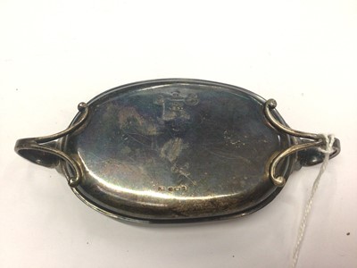 Lot 303 - Georg Jensen Danish silver twin handled pin dish of oval form, marks to base, H N Denmark, Sterling 433 and Georg Jensen marks, 13cm in diameter.