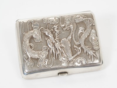 Lot 329 - Late 19th/early 20th century Chinese silver cigarette case with raised Dragon decoration