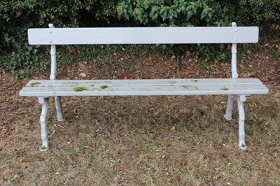 Lot 1337 - Victorian grey painted cast iron bench with naturalistic gnarled supports and wooden slats, 180cm wide