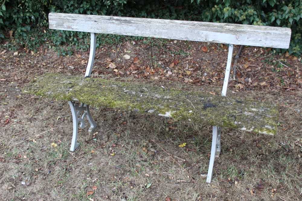 Lot 1278 - Victorian grey painted cast iron bench, with gothic tracery supports, 149cm long