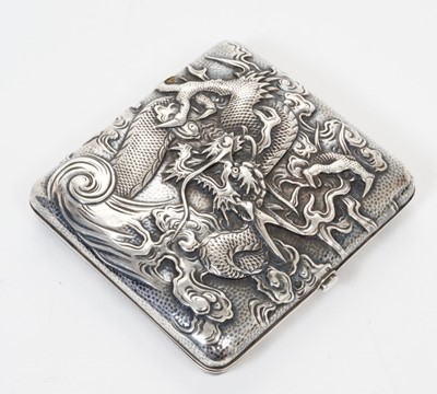 Lot 332 - Late 19th/early 20th century Chinese silver cigarette case with raised Dragon decoration and silver gilt interior with Chinese character mark. All at approximately 3ozs. 8.5cm overall length.