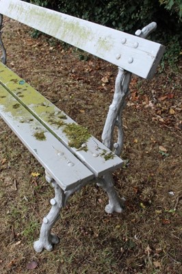 Lot 1339 - Victorian grey painted cast iron bench, with naturalistic branch work supports, kite mark and registration number to one end, 166cm long