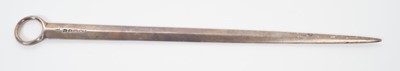 Lot 307 - George III silver meat skewer of tapered form, with suspension loop and engraved armorial, (London 1826), all at 3ozs, 28cm in overall length.