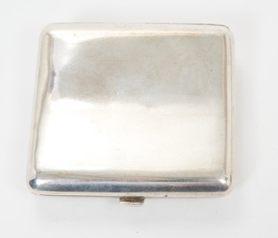 Lot 334 - Late 19th/early 20th century Chinese silver cigarette case of shaped form, with raised Dragon decoration and silver gilt interior, stamped WANG.FAI. All at approximately 3ozs. 8cm overall length.