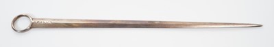 Lot 308 - William IV silver meat skewer of tapered form, with suspension loop and engraved initials (London 1832), all at 3ozs, 28.3cm in overall length.