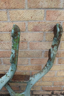 Lot 1341 - Set of three cast iron bench supports