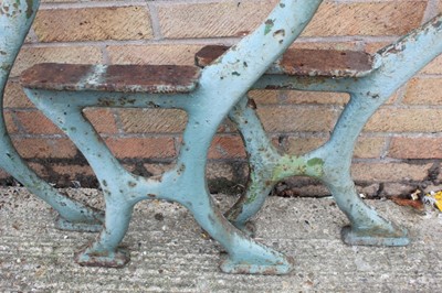 Lot 1341 - Set of three cast iron bench supports