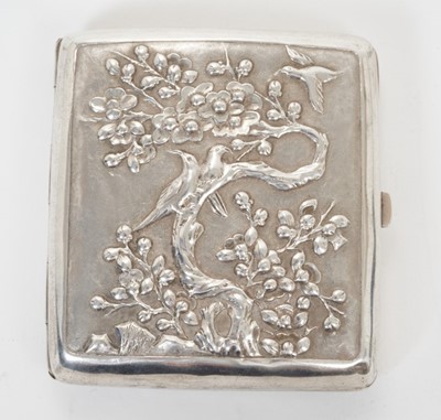 Lot 335 - Late 19th/early 20th century Chinese white metal cigarette case, the cover with raised Dragon decoration and a vacant cartouche, the rear with birds in cherry tree, silver gilt interior, marked onl...