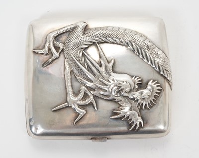 Lot 337 - Late 19th/early 20th century Chinese white metal cigarette case with raised continuous Dragon decoration and silver gilt interior, apprently unmarked. All at approximately 4ozs. 8.3cm overall lengt...