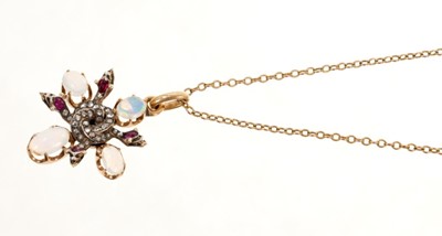 Lot 539 - Unusual late Victorian opal, diamond and ruby pendant with four interwoven snakes set with rose cut diamonds and rubies, and four cabochon opals, in silver and gold setting on a gold chain with bar...