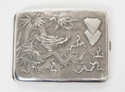 Lot 341 - Late 19th/early 20th century Chinese white metal cigarette case, the cover with raised Dragon decoration and vacant cartouche, the rear chequered, silver gilt interior, apparently unmarked, All at...