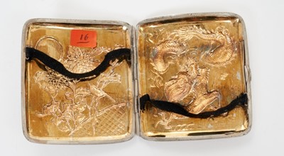 Lot 342 - Late 19th/early 20th century Chinese silver cigarette case of shaped form, the cover with raised Chrysanthemum decoration and vacant cartouche, the rear with raised Dragon decoration, silver gilt i...