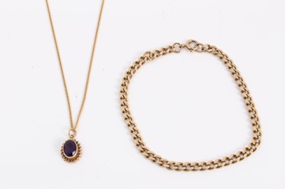 Lot 533 - 9ct gold curb link bracelet and an amethyst single stone pendant in gold mount on chain (2)