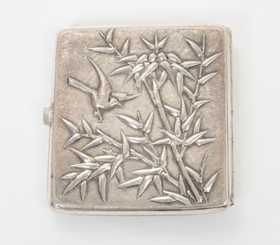 Lot 347 - Late 19th/early 20th century Chinese white metal cigarette case, the cover with raised Dragon decoration and engraved initials, the rear decorated with bamboo and a bird, silver gilt interior, appa...