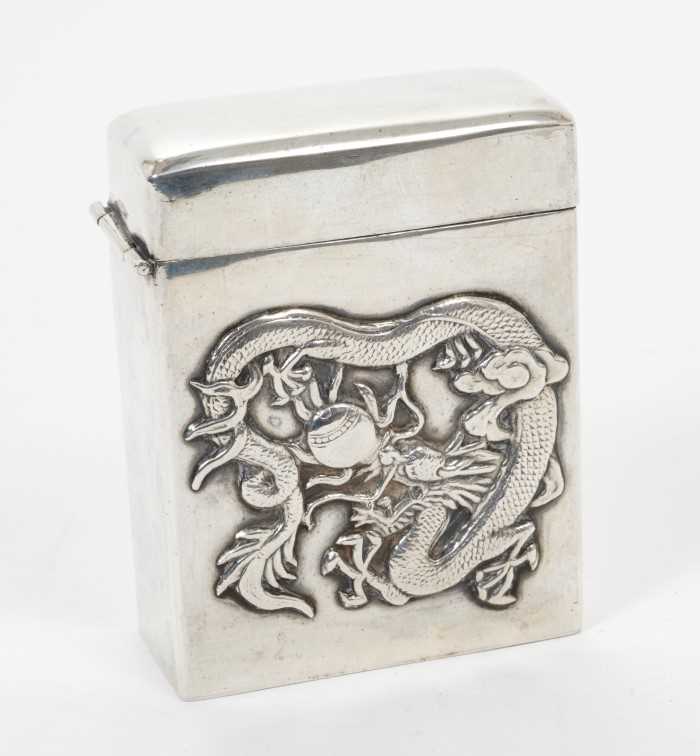 Lot 348 - Late 19th/early 20th century Chinese silver cigarette box of plain rectangular form, the front panel with raised Dragon decoration, underside stamped "Sterling" All at approximately 3ozs. 7.7cm ove...