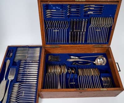Lot 355 - Extensive canteen of Edwardian silver cutlery (Birmingham 1907), maker Elkington & Co, each piece with engraved armorial, comprising, x1 pair of fish servers, x3 mustard spoons, x12 fish forks, x12...