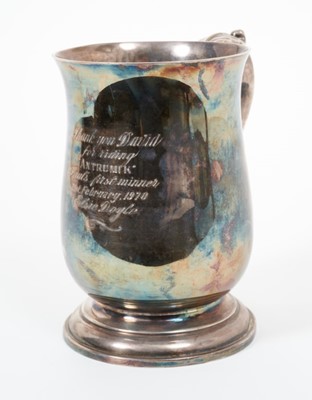 Lot 356 - Elizabeth II silver tankard of baluster form, with scroll handlem on circular foot, with engraved presentation inscription 'Thank you David for riding ''Antrumik'' Paul's first winner 21st February...