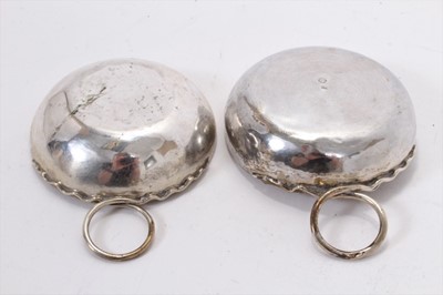 Lot 362 - Pair of 19th century French silver wine tasters, one stamped J Supiot, the other R Bidet, each 7.3cm in diameter.