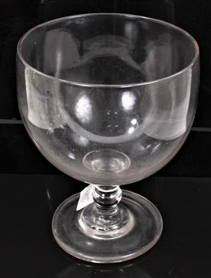 Lot 342 - Large late Georgian glass goblet, possibly a goldfish bowl, on a knopped stem above a ciruclar foot, snapped pontil mark, measuring 24cm high and 19cm diameter