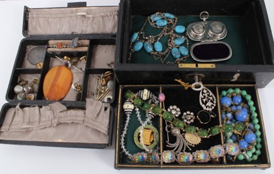 Lot 551 - Two antique jewellery boxes containing a collection of antique and vintage jewellery and bijouterie to include a scarab beetle bracelet, a silver and guilloché enamel bracelet stamped BMCo, 9ct gol...