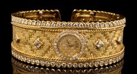 Lot 584 - Fine Etoile gold (18ct) and diamond set...