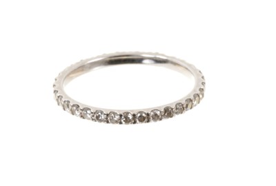 Lot 556 - Diamond eternity ring with a full band of 35 brilliant cut diamonds in 18ct white gold setting, estimated total diamond weight approximately 0.70cts, ring size O.