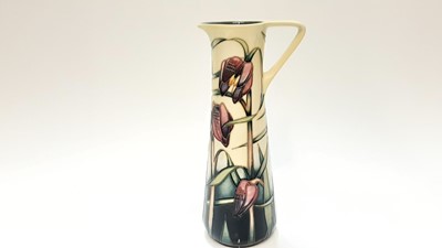 Lot 1146 - Moorcroft pottery jug decorated in the Cricklade pattern by Emma Bossons, signed Anji Davenport, dated 2001