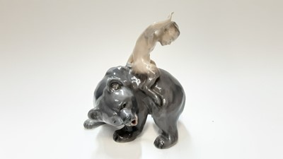 Lot 1229 - Royal Copenhagen porcelain figure of a fawn on a bears back and another of a bird (2)