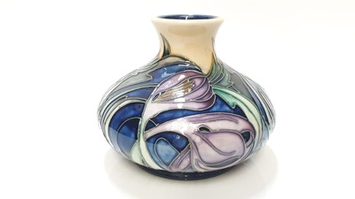 Lot 1110 - Moorcroft pottery limited edition squat vase decorated in the Saffron Crocus pattern for Thaxted Church by Emma Bossons, no. 18 of 150, dated 2003, painted by Pamela Deares, 11cm high, boxed